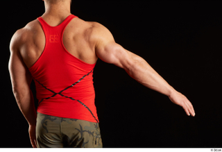 Dave  1 arm back view dressed flexing red tank…